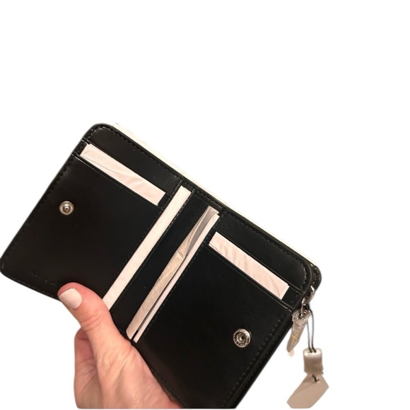 NWT Marc Jacobs, Textured Black Wallet w/silver hardware Coin purse
No callouts - Picture 4 of 8